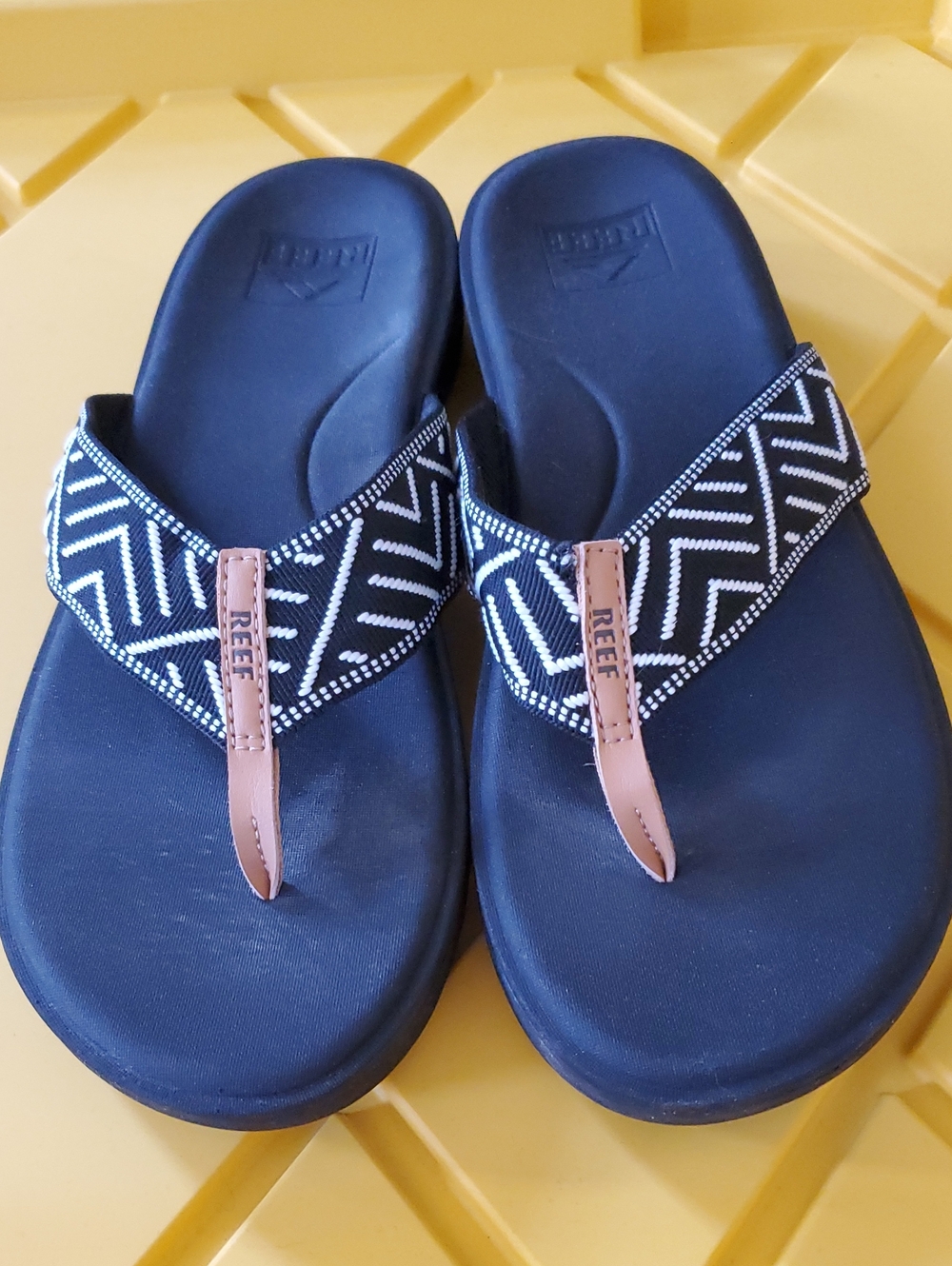 Reef Women's Black And White Flip Flops with Patterned Straps